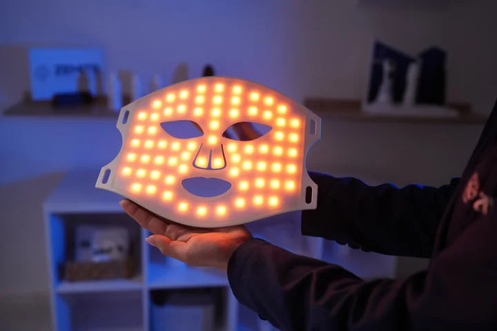 MaiSkin LED mask illuminated in the combined red and green program